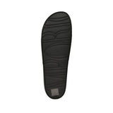 Bottom view of a black slide slipper. The sole features raised "MDOR" lettering and small molded symbols.
