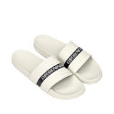 Pair of white slide slippers with ridged straps. Each strap has a black band with "EMPORIO ARMANI" and logo in white.