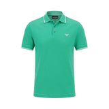 Emerald green pique polo shirt with ribbed collar and cuffs, each with two white stripes. 2-button placket, white logo.