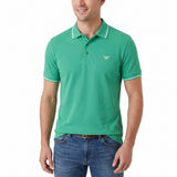 Emerald green men's pique knit polo shirt with white striped ribbed collar and cuffs, and a white embroidered logo on the che