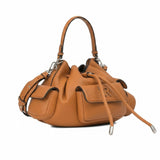 Right three-quarter angled view of the Ermanno Firenze tan drawstring bag at BLUE SALON, showcasing the slouchy silhouette, side flap pockets, and long metal-tipped drawcords.