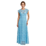 A smiling model wearing the elegant cerulean blue geometric lace maxi dress from BLUE SALON shop, displaying its tailored A-line silhouette.