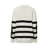 A white and black striped V-neck cardigan by ERMANNO FIRENZE with intricate black floral lace embroidery on the sleeves.
