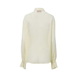 ERMANNO FIRENZE long-sleeve button-down shirt in pale yellow silk chiffon with a large decorative lace and sequin bib on the chest.
