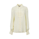 ERMANNO FIRENZE long-sleeve button-down shirt in pale yellow silk chiffon with a large decorative lace and sequin bib on the chest.