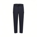 Front studio shot of men's Eden Park cargo trousers in navy blue, showcasing the tailored front pleats, drawstring waistband, and streamlined side cargo pockets.