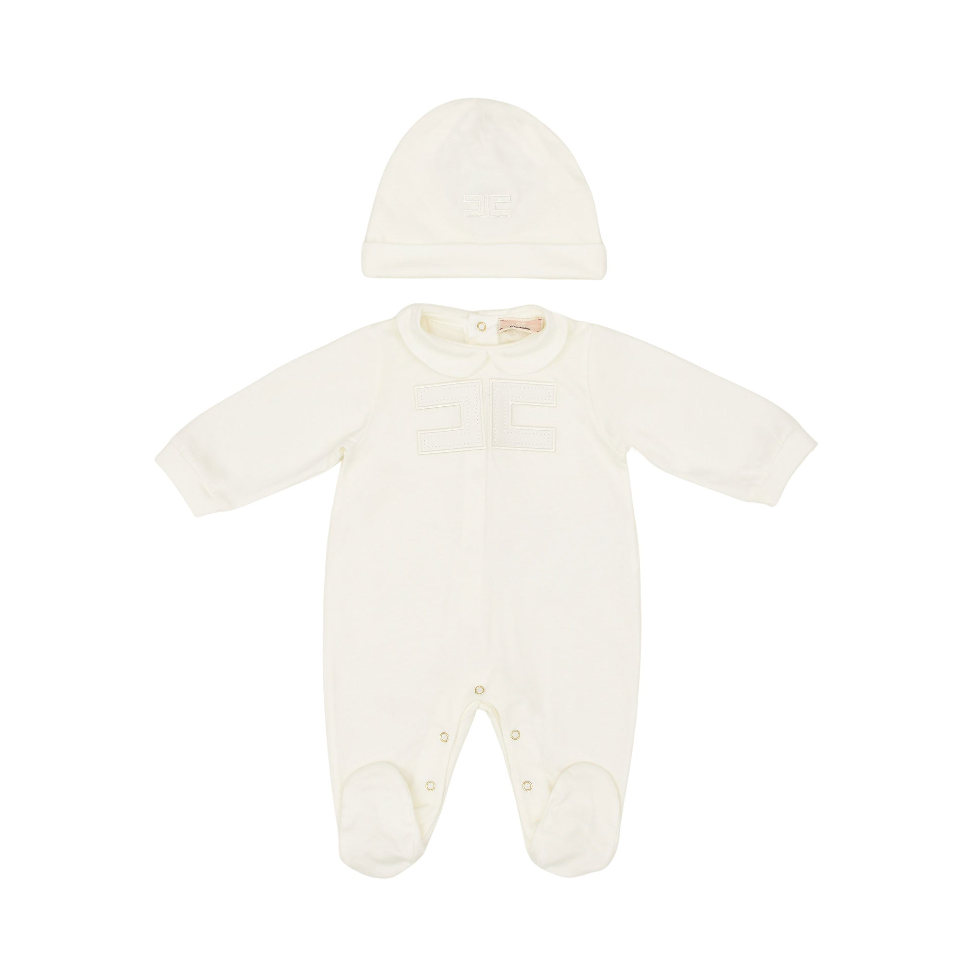 Full front view of a two-piece baby set by Elisabetta Franchi featuring an off-white long-sleeved romper with feet and a matching beanie with an embroidered logo.