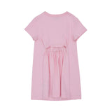 Rear view of a pink Emilio Pucci girls' dress showcasing a horizontal cut-out and gathered ruffle detailing on the back.