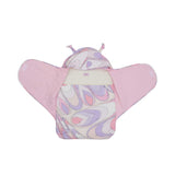 Interior view of the Emilio Pucci baby nest opened wide, showing the pink cotton lining, Velcro fasteners, and the Pucci designer label.