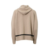 ERMANNO FIRENZE beige knit zip-up hoodie featuring black lattice embroidery on the shoulders and hem, a drawstring hood, and a sequined "E" logo patch on the chest.