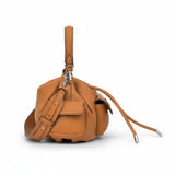 Brown leather handbag with a strap on a white background.
