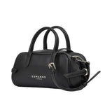 Three-quarter angled studio shot of the Ermanno Firenze black barrel handbag at BLUE SALON, highlighting the rich pebbled texture and side buckle details.