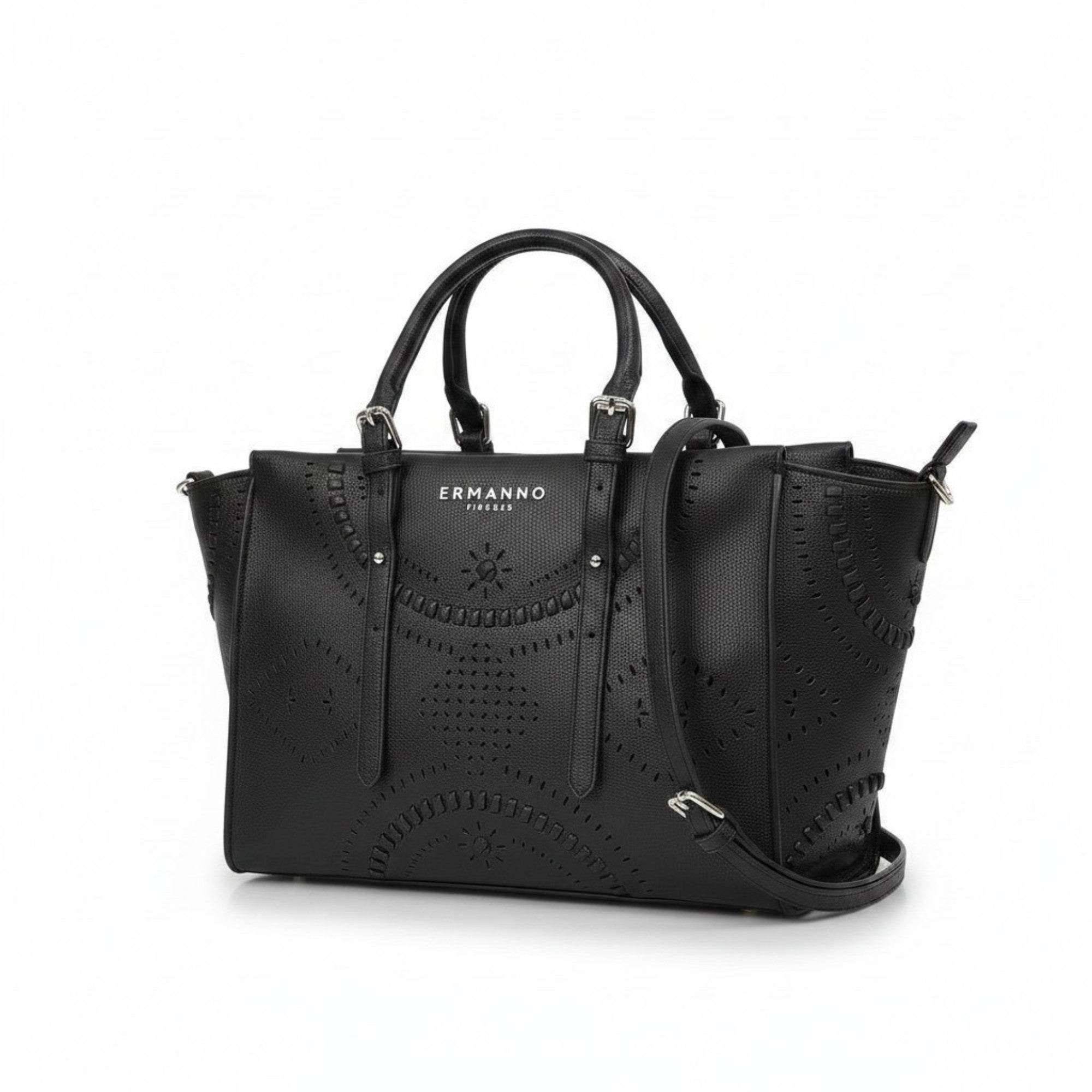 Three-quarter view of the black Ermanno Firenze laser-cut tote bag from the BLUE SALON shop, highlighting its textured finish, dual top handles, and detachable shoulder strap on a white background.