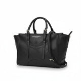 Three-quarter view of the black Ermanno Firenze laser-cut tote bag from the BLUE SALON shop, highlighting its textured finish, dual top handles, and detachable shoulder strap on a white background.