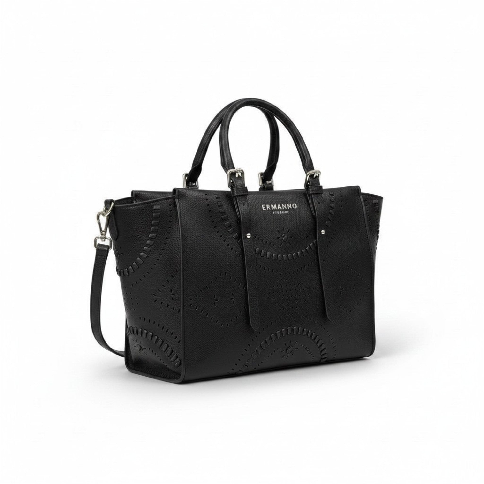 Three-quarter view of the black Ermanno Firenze laser-cut tote bag from the BLUE SALON shop, highlighting its textured finish, dual top handles, and detachable shoulder strap on a white background.