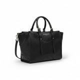 Three-quarter view of the black Ermanno Firenze laser-cut tote bag from the BLUE SALON shop, highlighting its textured finish, dual top handles, and detachable shoulder strap on a white background.