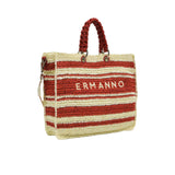 Three-quarter angled view of the Ermanno Firenze striped woven handbag at BLUE SALON, showcasing the structured side depth and attached canvas shoulder strap.