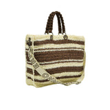Left angled studio portrait of the Ermanno Firenze woven tote from BLUE SALON, highlighting the seamless striped alignment along the side seams and the textured weave.