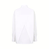 Back view of the Ermanno Firenze white shirt highlighting the contemporary inverted-V overlapping split back panel, available at BLUE SALON shop.
