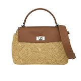 Direct front view of the Ermanno Firenze woven lace handbag from the BLUE SALON shop, showing its cognac leather top flap, silver turn-lock closure, and attached debossed leather shoulder strap.