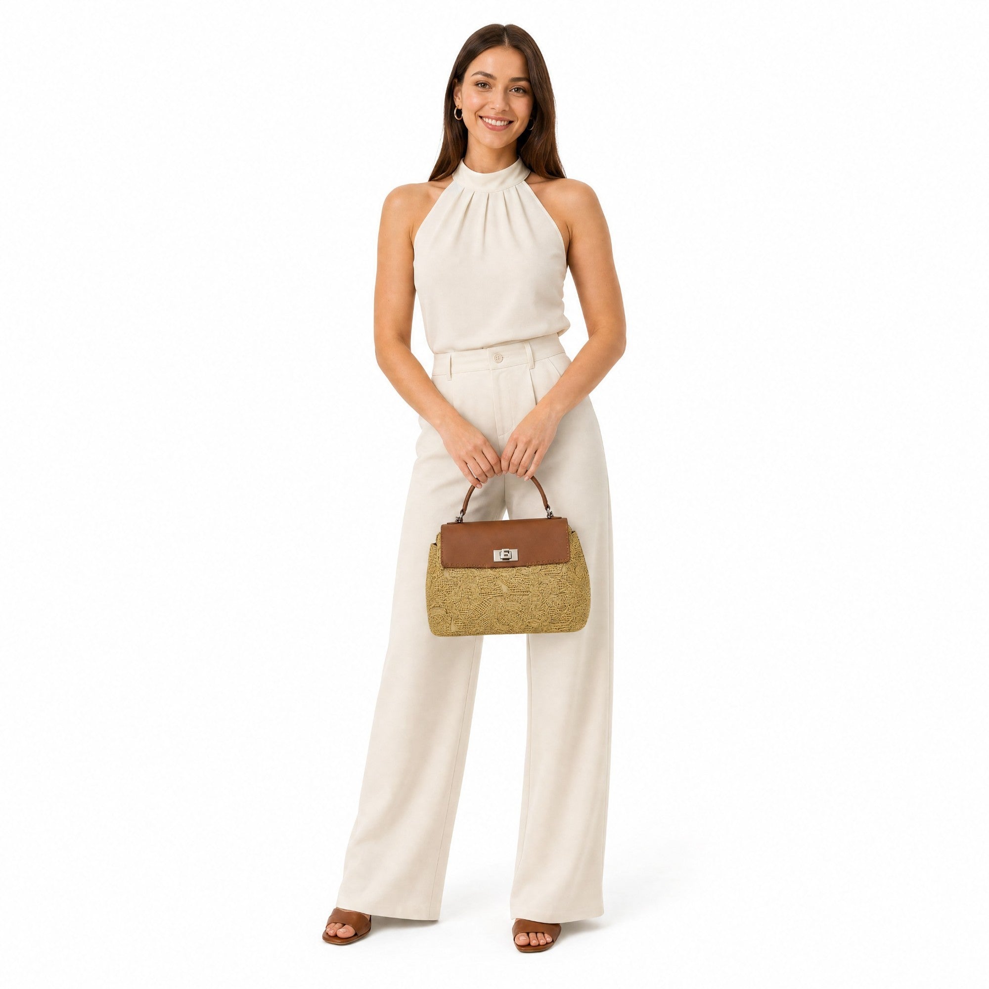 Woman holding a brown handbag against a white background.