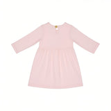 Back view of the Escada Kids girls light pink jersey dress showcasing long sleeves, a high gathered waistline, and a keyhole cutout at the neckline with a single gold button.