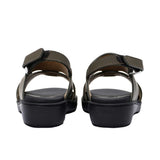 Pair of FARES brand white leather sandals with black soles and adjustable heel straps, featuring a modern geometric cutout design on a white background.