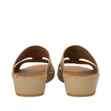 Rear view of a pair of FARES beige leather sandals highlighting the sturdy, clean wedge heel construction and the interior sizing stamps printed on the smooth leather lining against a white background.