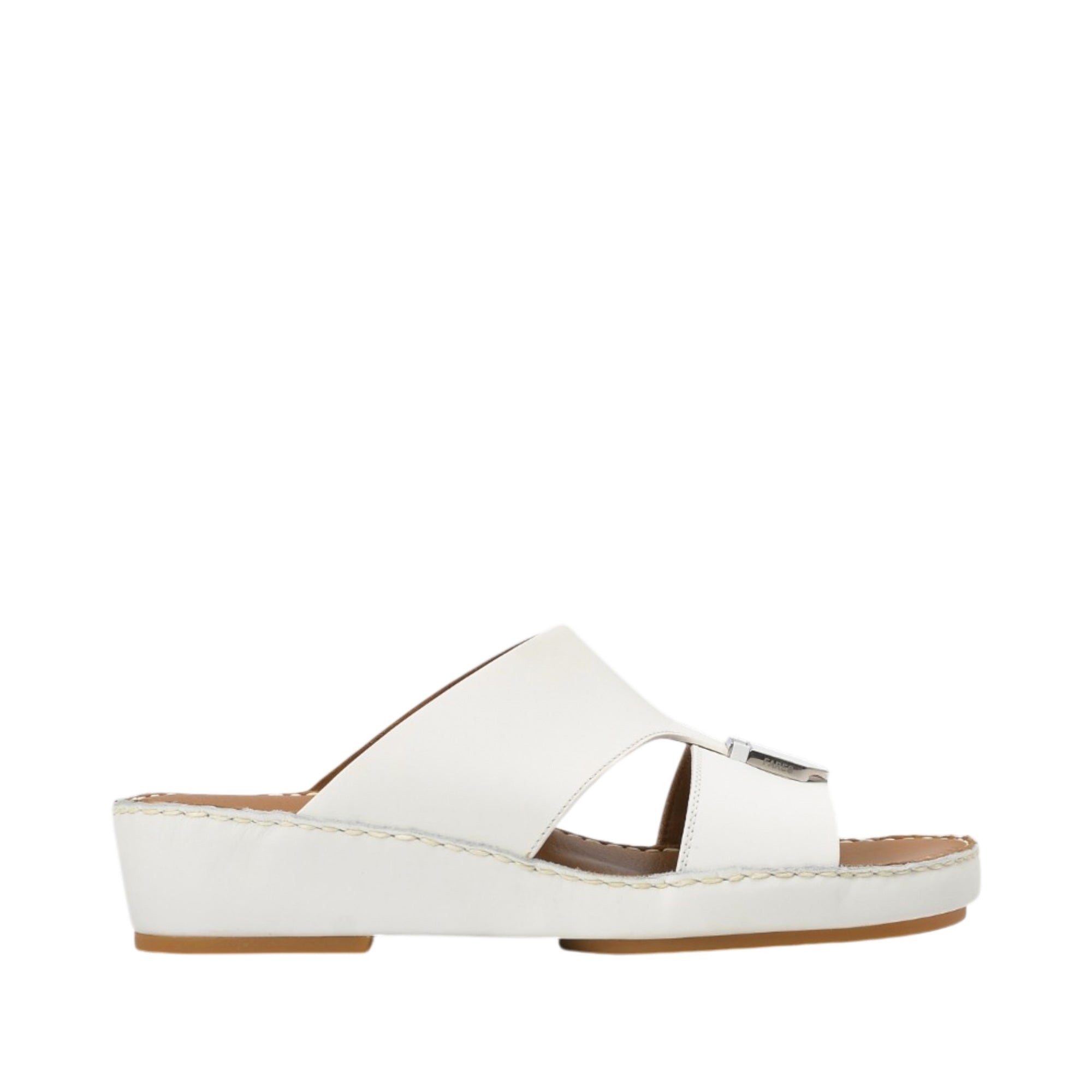 Profile view of a FARES white leather traditional Arabian sandal showing its elevated wedge-style midsole, smooth leather upper strap, and front metallic buckle accent against a white background.