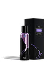M.INT Fashion Intervention Eau de Parfum 75ml bottle with black box packaging and purple wave accents, featuring a sleek and contemporary fragrance design, Now Online.
