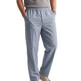 Light blue heathered pants with an elasticized waistband, side pockets, and a relaxed, straight-leg fit.