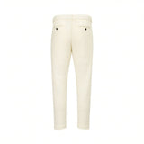 Milk-colored textured knit jogger pants with an elastic drawstring waistband and two back welt pockets with black buttons.