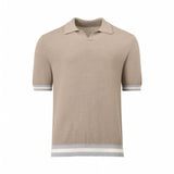 Beige textured short-sleeve polo sweater with a spread collar, V-neck, and blue/cream striped cuffs and hem.