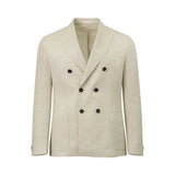 Ecru double-breasted linen suit jacket with peak lapels, six black buttons, two patch pockets, and three cuff buttons.