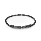 Black tennis bracelet with small, square-faceted crystals and a rectangular black clasp featuring the "POLICE" logo.