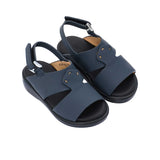 Pair of FARES kids' Arabic-style sandals in matte navy blue leather with adjustable back straps and black cushioned soles on a white background.