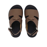 Pair of FARES kids' Arabic-style sandals in matte navy blue leather with adjustable back straps and black cushioned soles on a white background.