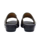 A pair of FARES kids' leather slip-on Arabic sandals with a minimalist wide-strap design and cushioned.