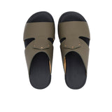 A pair of FARES kids' leather slip-on Arabic sandals with a minimalist wide-strap design and cushioned.