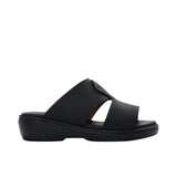 A pair of FARES kids' leather slip-on Arabic sandals with a minimalist wide-strap design and cushioned.