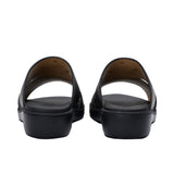 A pair of FARES kids' leather slip-on Arabic sandals with a minimalist wide-strap design and cushioned.
