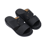 A pair of FARES kids' leather slip-on Arabic sandals with a minimalist wide-strap design and cushioned.