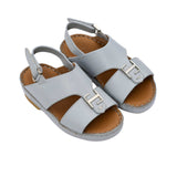 FARES brand luxury boys' sandals leather with tan footbeds and silver "F" logo buckles on a white background.