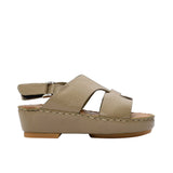 Pair of FARES leather sandals with tan footbeds, visible perimeter stitching, and adjustable heel straps on a white background.
