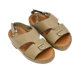 Pair of FARES  textured leather sandals with tan footbeds, visible perimeter stitching, and adjustable heel straps on a white background.