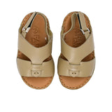 Pair of FARES  textured leather sandals with tan footbeds, visible perimeter stitching, and adjustable heel straps on a white background.