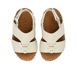 Pair of FARES  textured leather sandals with tan footbeds, visible perimeter stitching, and adjustable heel straps on a white background.