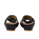 Pair of FARES  textured leather sandals with tan footbeds, visible perimeter stitching, and adjustable heel straps on a white background.