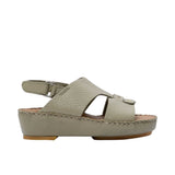 Pair of FARES  textured leather sandals with tan footbeds, visible perimeter stitching, and adjustable heel straps on a white background.