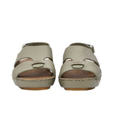 Pair of FARES  textured leather sandals with tan footbeds, visible perimeter stitching, and adjustable heel straps on a white background.